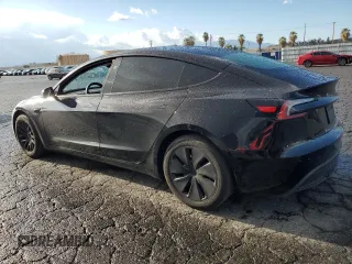 2024 Tesla Model 3 with VIN 5YJ3E1EA5RF738574, listed as a Copart auction lot 48425325 with 9,423 mi miles and Salvage Title. Bid and sale history available at DreamBid. Image 2.