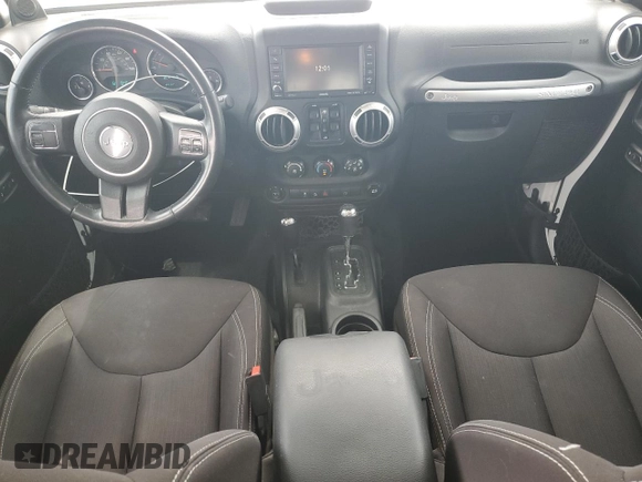 2014 Jeep Wrangler Unlimited Sahara with VIN 1C4BJWEG8EL266340, listed as a Copart auction lot 57809465 with 121,191 mi miles and Salvage title. Bid and sale history available at DreamBid. Image 8.