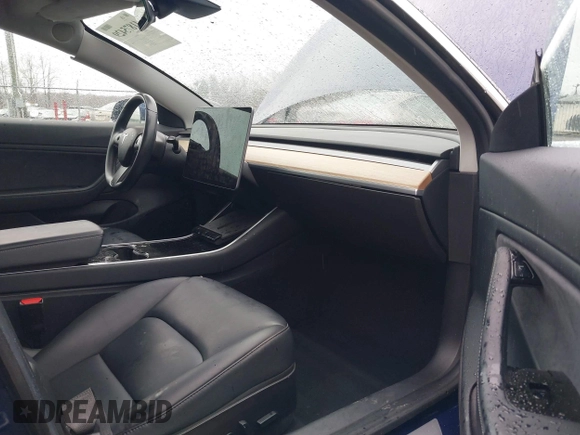 2018 Tesla Model 3 Long Range Battery with VIN 5YJ3E1EA9JF022782, listed as a IAAI auction lot 41875429 with 79,209 mi miles. Bid and sale history available at carsss.com. Image 5.
