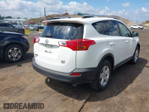 2013 Toyota RAV4 XLE with VIN JTMRFREV4D5000543, listed as a IAAI auction lot 42703469 with 231,337 mi miles and . Bid and sale history available at DreamBid. Image 4.
