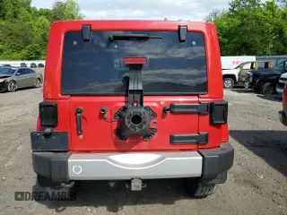 2012 Jeep Wrangler Unlimited Sahara with VIN 1C4BJWEG0CL128417, listed as a Copart auction lot 56243815 with 95,635 mi miles and Salvage title. Bid and sale history available at DreamBid. Image 6.