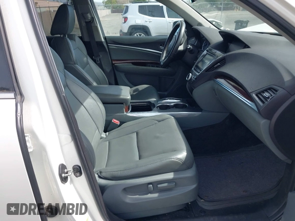 2016 Acura MDX w/Tech with VIN 5FRYD3H4XGB009265, listed as a IAAI auction lot 41691872 with 123,798 mi miles. Bid and sale history available at carsss.com. Image 5.