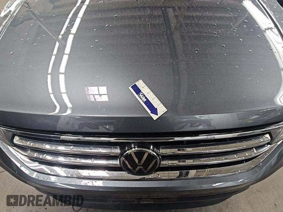 2024 Volkswagen Tiguan SE z VIN 3VV3B7AX3RM106966, wystawiony jako IAAI lot #42809081 z przebiegiem 32 302 mil mil oraz . Historia ofert i sprzedaży dostępna na DreamBid. Obrazek 4.