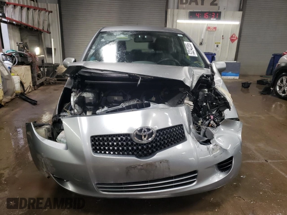 2007 Toyota Yaris with VIN JTDJT923275114473, listed as a Copart auction lot 52242355 with 137,963 mi miles and Salvage Title. Bid and sale history available at carsss.com. Image 5.