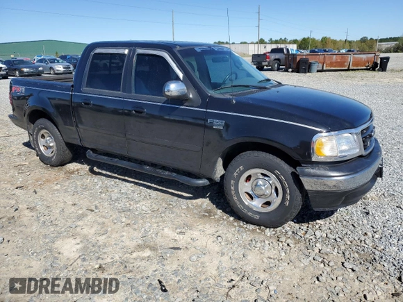 2001 Ford F-150 XLT with VIN 1FTRW07W11KE08545, listed as a Copart auction lot 49869415 with 264,349 mi miles and Salvage title. Bid and sale history available at DreamBid. Image 4.