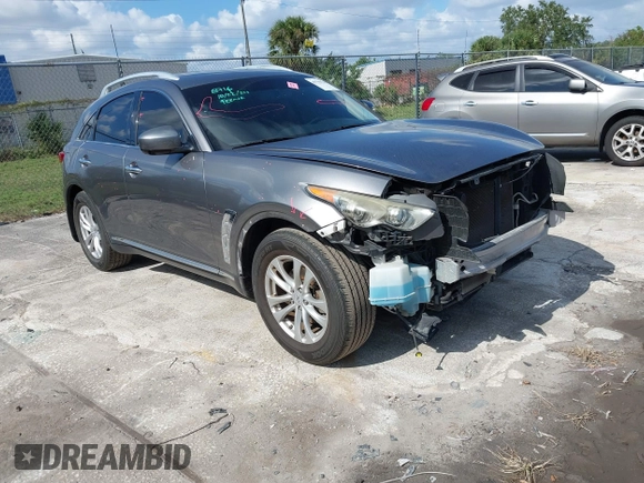 2013 Infiniti FX with VIN JN8CS1MU0DM140711, listed as a IAAI auction lot 40796518 with 179,386 mi miles and . Bid and sale history available at DreamBid. Image 1.