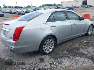2014 Cadillac CTS Luxury RWD z VIN 1G6AR5S38E0173628, wystawiony jako IAAI lot #42343647 z przebiegiem 166 035 mil mil oraz . Historia ofert i sprzedaży dostępna na DreamBid. Obrazek 4.