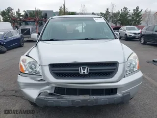 2004 Honda Pilot EX with VIN 2HKYF18644H596075, listed as a IAAI auction lot 41093500 with 92,952 mi miles. Bid and sale history available at carsss.com. Image 12.
