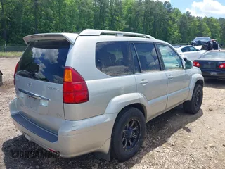 2004 Lexus GX 470 with VIN JTJBT20X640035217, listed as a IAAI auction lot 42156303 with 310,711 mi miles and . Bid and sale history available at DreamBid. Image 4.