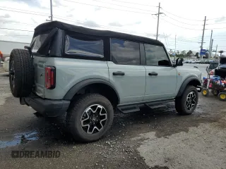2024 Ford Bronco Badlands z VIN 1FMEE9BP3RLA46984, wystawiony jako Copart lot #55505075 z przebiegiem 4089 mil mil oraz Szkody całkowita. Historia ofert i sprzedaży dostępna na DreamBid. Obrazek 3.