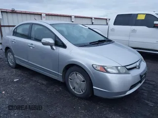2006 Honda Civic z VIN JHMFA36216S004779, wystawiony jako IAAI lot #41226569 z przebiegiem 197 410 mil mil oraz . Historia ofert i sprzedaży dostępna na DreamBid. Obrazek 1.