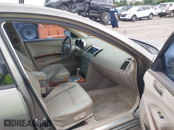 2004 Nissan Maxima SE with VIN 1N4BA41E74C858809, listed as a IAAI auction lot 42436562 with 198,105 mi miles and . Bid and sale history available at DreamBid. Image 5.