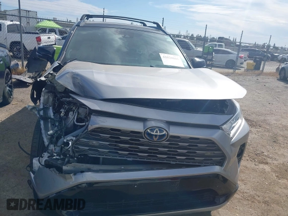 2021 Toyota RAV4 Hybrid XSE with VIN 4T3E6RFV6MU040399, listed as a IAAI auction lot 42020866 with 46,593 mi miles and . Bid and sale history available at DreamBid. Image 13.