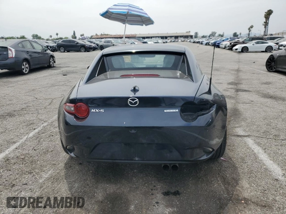 2021 Mazda MX-5 Miata Grand Touring with VIN JM1NDAM70M0460532, listed as a Copart auction lot 58828045 with 70,269 mi miles and Salvage title. Bid and sale history available at DreamBid. Image 6.