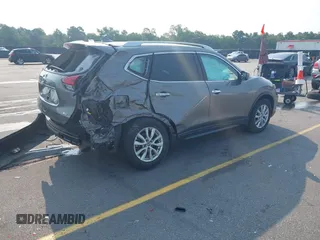 2019 Nissan Rogue SV with VIN KNMAT2MT2KP544859, listed as a IAAI auction lot 42389458 with 80,976 mi miles and . Bid and sale history available at DreamBid. Image 4.