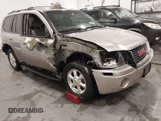 2003 GMC Envoy SLT with VIN 1GKDT13S932395367, listed as a IAAI auction lot 41544810 with 142,012 mi miles. Bid and sale history available at carsss.com. Image 6.