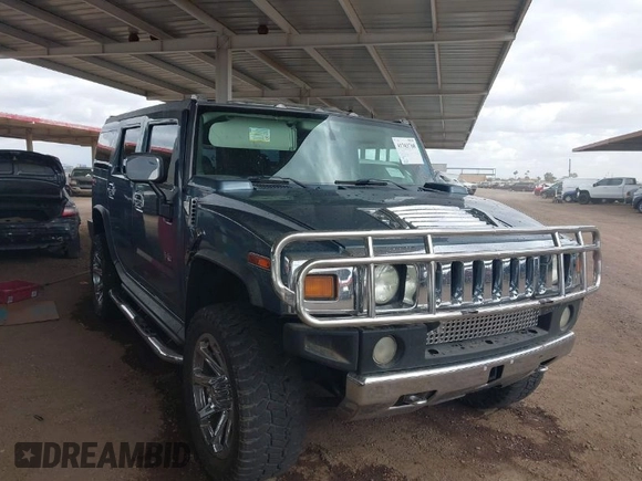 2005 Hummer H2 SUV with VIN 5GRGN23U25H107505, listed as a IAAI auction lot 41703768 with 213,723 mi miles. Bid and sale history available at carsss.com. Image 1.