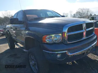 2004 Dodge Ram 2500 SLT with VIN 1D7KU28D64J263003, listed as a IAAI auction lot 41660674 with 230,533 mi miles. Bid and sale history available at carsss.com. Image 1.