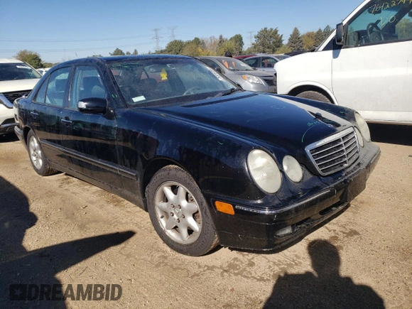 2001 Mercedes-Benz E-Class with VIN WDBJF65J01B325792, listed as a Copart auction lot 76328704 with 101,886 mi miles and Salvage Title. Bid and sale history available at carsss.com. Image 4.