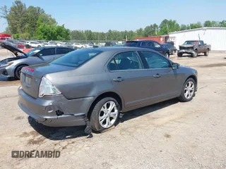 2012 Ford Fusion SE z VIN 3FAHP0HA4CR232641, wystawiony jako IAAI lot #42057070 z przebiegiem 180 793 mil mil oraz . Historia ofert i sprzedaży dostępna na DreamBid. Obrazek 4.