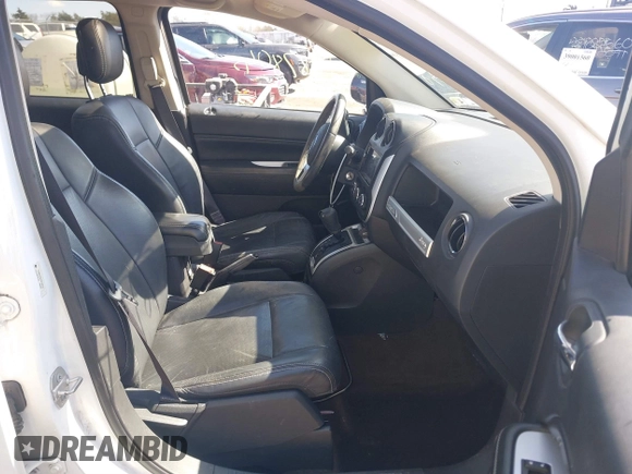 2015 Jeep Compass Latitude with VIN 1C4NJDEB7FD120738, listed as a IAAI auction lot 41878045 with 128,393 mi miles. Bid and sale history available at carsss.com. Image 5.
