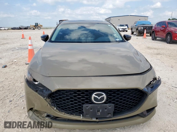 2024 Mazda 3 Carbon Edition with VIN 3MZBPBXYXRM409075, listed as a Copart auction lot 59189265 with 23,114 mi miles and Salvage title. Bid and sale history available at DreamBid. Image 5.