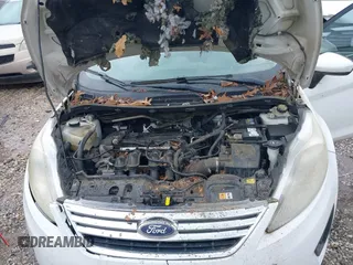 2012 Ford Fiesta SE with VIN 3FADP4BJ0CM220742, listed as a IAAI auction lot 42207303 with 175,875 mi miles and . Bid and sale history available at DreamBid. Image 10.
