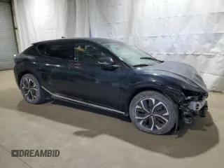 2023 Kia EV6 Wind with VIN KNDC34LA9P5604093, listed as a Copart auction lot 46487755 with 26,682 mi miles and Salvage Title. Bid and sale history available at carsss.com. Image 4.