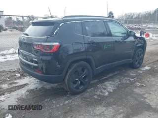 2018 Jeep Compass Altitude with VIN 3C4NJDBB1JT132052, listed as a IAAI auction lot 41622700 with 99,534 mi miles and . Bid and sale history available at carsss.com. Image 4.