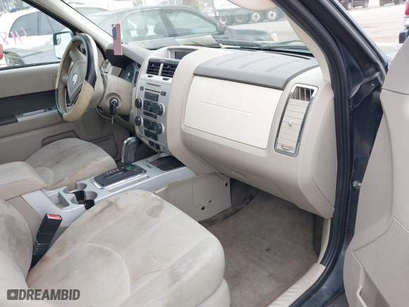 2010 Mercury Mariner with VIN 4M2CN8B74AKJ02926, listed as a IAAI auction lot 41890612 with 240,322 mi miles. Bid and sale history available at carsss.com. Image 5.