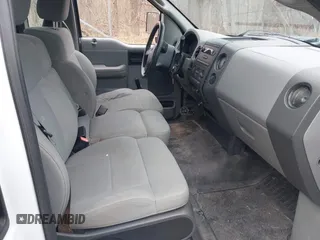 2007 Ford F-150 XL with VIN 1FTRF12257NA47662, listed as a IAAI auction lot 42003991 with 154,502 mi miles. Bid and sale history available at carsss.com. Image 5.