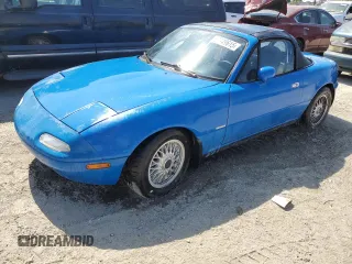 1991 Mazda MX-5 Miata Special Edition z VIN JM1NA3510M1218378, wystawiony jako Copart lot #57149615 z przebiegiem 147 632 mil mil oraz Czysty tytuł • Clean title. Historia ofert i sprzedaży dostępna na DreamBid. Obrazek 1.