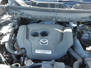 2022 Mazda CX-9 Sport with VIN JM3TCBBY5N0614589, listed as a IAAI auction lot 41295944 with 49,193 mi miles and . Bid and sale history available at DreamBid. Image 10.