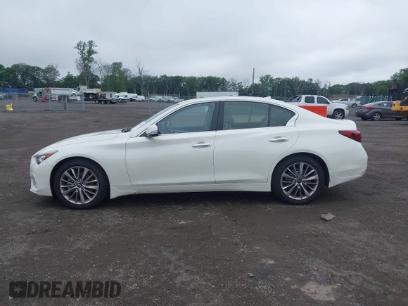 2023 Infiniti Q50 Luxe with VIN JN1EV7BR5PM541157, listed as a IAAI auction lot 42452178 with 60,271 mi miles and . Bid and sale history available at DreamBid. Image 14.