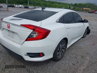 2018 Honda Civic LX with VIN 2HGFC2F59JH576975, listed as a IAAI auction lot 42098020 with 89,791 mi miles and . Bid and sale history available at DreamBid. Image 4.