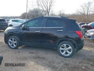 2015 Chevrolet Trax LTZ with VIN KL7CJTSB9FB101817, listed as a IAAI auction lot 41090727 with 108,959 mi miles. Bid and sale history available at carsss.com. Image 14.