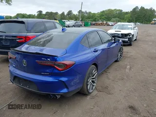 2021 Acura TLX w/A-Spec Package z VIN 19UUB6F58MA005983, wystawiony jako IAAI lot #42245986 z przebiegiem 62 408 mil mil oraz . Historia ofert i sprzedaży dostępna na DreamBid. Obrazek 4.