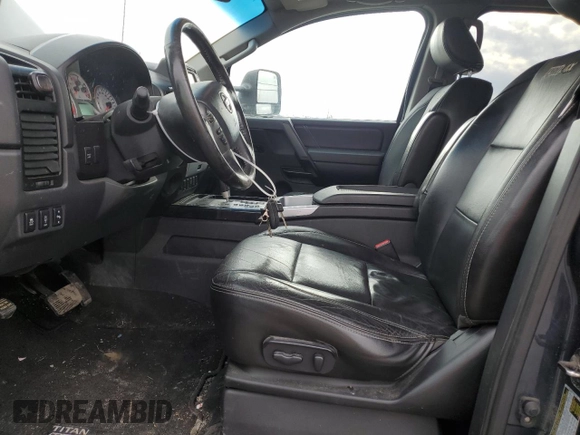 2013 Nissan Titan Pro-4X with VIN 1N6AA0ECXDN314703, listed as a Copart auction lot 49507105 with 287,763 mi miles and Salvage title. Bid and sale history available at DreamBid. Image 7.