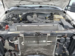 2010 Ford F-250 with VIN 1FTNF2A55AEA02289, listed as a Copart auction lot 49126995 with 142,929 mi miles and Salvage title. Bid and sale history available at DreamBid. Image 11.