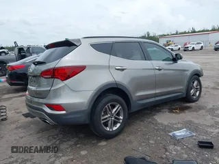 2017 Hyundai Santa Fe 2.4L with VIN 5NMZU3LB2HH014844, listed as a IAAI auction lot 42657624 with 93,533 mi miles and . Bid and sale history available at DreamBid. Image 4.