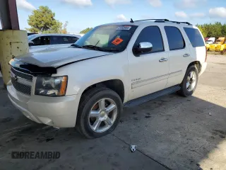 2014 Chevrolet Tahoe LTZ z VIN 1GNSCCE08ER124778, wystawiony jako Copart lot #72452854 z przebiegiem Nie podano mil oraz Czysty tytuł • Clean title. Historia ofert i sprzedaży dostępna na DreamBid. Obrazek 1.