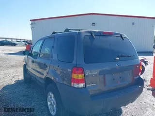 2006 Ford Escape XLT with VIN 1FMYU03106KA54774, listed as a IAAI auction lot 41940956 with 146,674 mi miles. Bid and sale history available at carsss.com. Image 3.