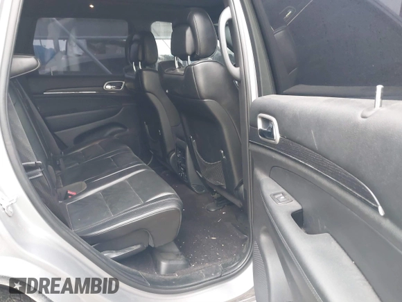 2018 Jeep Grand Cherokee High Altitude with VIN 1C4RJFCG4JC360338, listed as a IAAI auction lot 41250674 with 83,924 mi miles. Bid and sale history available at carsss.com. Image 8.