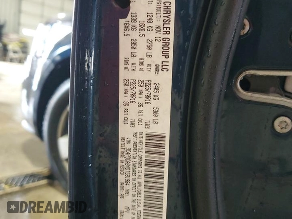 2013 Dodge Journey American Value with VIN 3C4PDCAB4DT581984, listed as a Copart auction lot 59953515 with 166,927 mi miles and Salvage title. Bid and sale history available at DreamBid. Image 14.