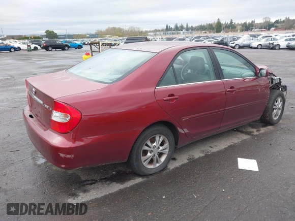 2005 Toyota Camry LE with VIN 4T1BF32K95U092132, listed as a IAAI auction lot 41831969 with 103,466 mi miles and . Bid and sale history available at DreamBid. Image 4.