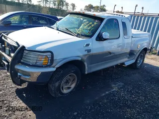 1998 Ford F-150 with VIN 2FTZX08W0WCA98105, listed as a IAAI auction lot 40930475 with Not provided miles and . Bid and sale history available at DreamBid. Image 2.