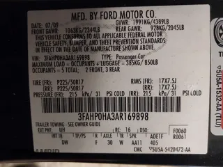 2010 Ford Fusion SE with VIN 3FAHP0HA3AR169898, listed as a IAAI auction lot 41033517 with 194,856 mi miles. Bid and sale history available at carsss.com. Image 9.