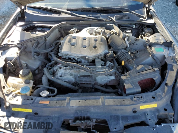 2004 Infiniti G35 Coupe w/Leather with VIN JNKCV54E44M827899, listed as a Copart auction lot 81534144 with 215,637 mi miles and Salvage Title. Bid and sale history available at carsss.com. Image 13.
