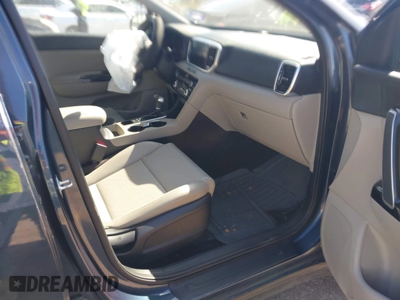 2021 Kia Sportage EX with VIN KNDPN3AC1M7889706, listed as a IAAI auction lot 41948559 with 52,329 mi miles and . Bid and sale history available at DreamBid. Image 5.