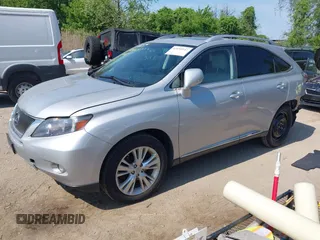 2010 Lexus RX 450h with VIN JTJBC1BA2A2412774, listed as a IAAI auction lot 42150247 with 148,920 mi miles and . Bid and sale history available at DreamBid. Image 2.